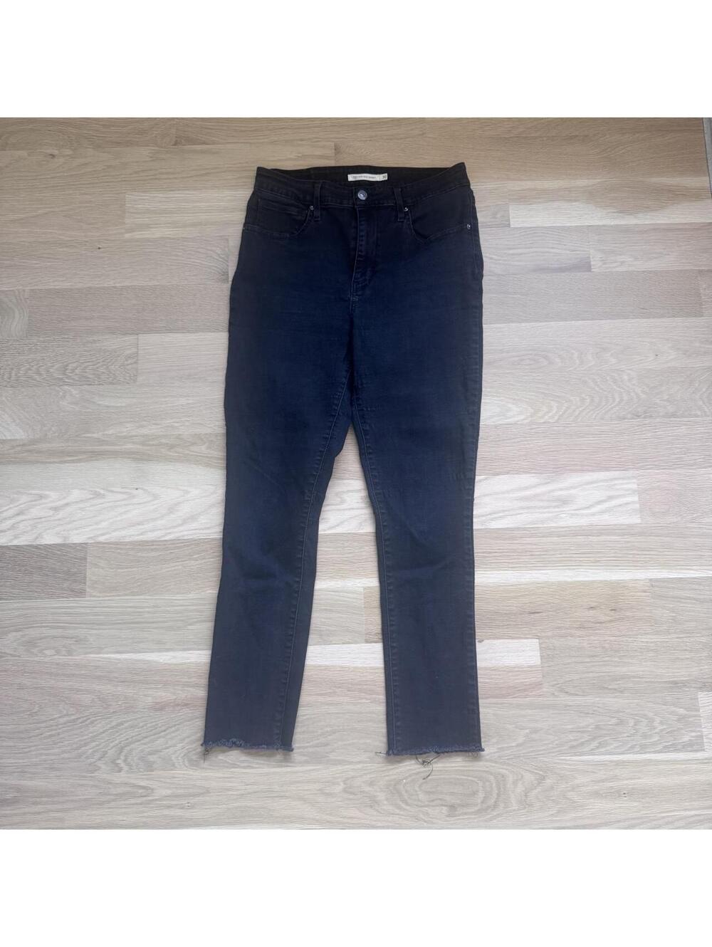 Levi’s 721 High Rise Skinny Black Raw Hem Jeans